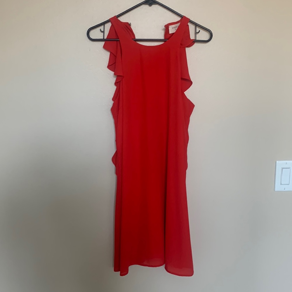 Red ruffled back. Just above the knee